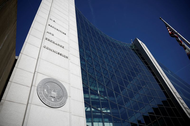 Former Bank of America banker charged in $18.5 million insider trading scheme