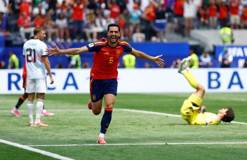 Merino's 88th-minute goal sends Spain past injury-ravaged Belgium into World Cup semis