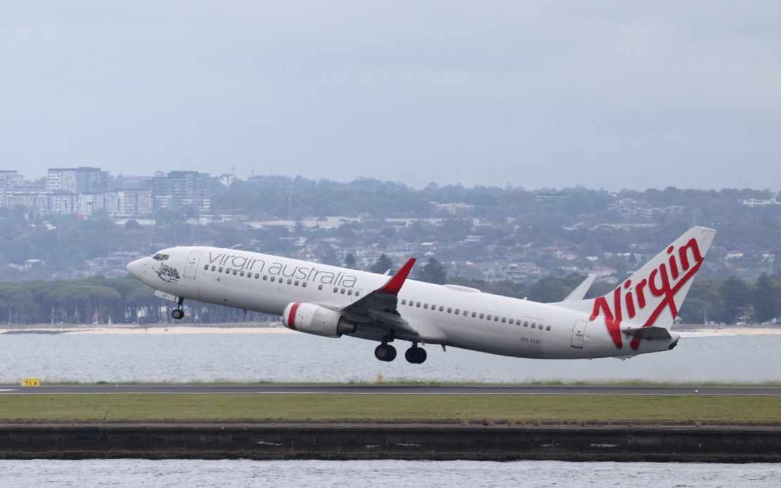 Jetstar and Qatar Airways Near-Miss at Sydney Airport Injures Crew Member