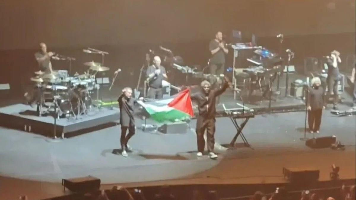 Massive Attack barred from Singapore over Palestinian flag display at concert