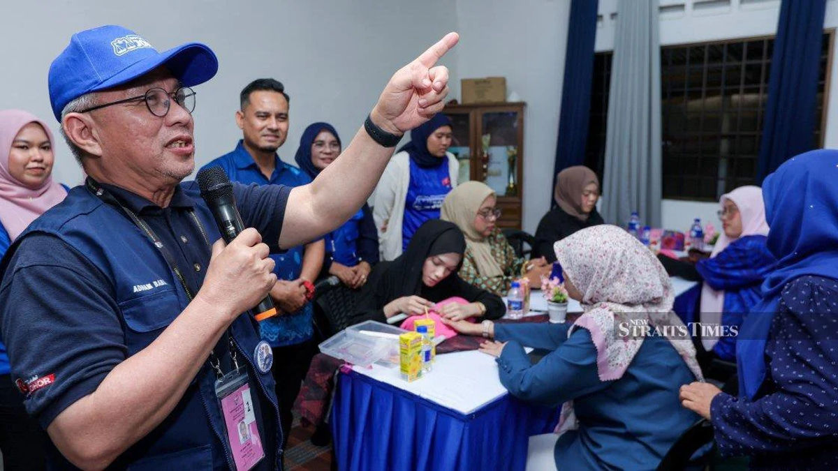 Barisan Nasional ahead in three key Johor state contests as votes are tallied