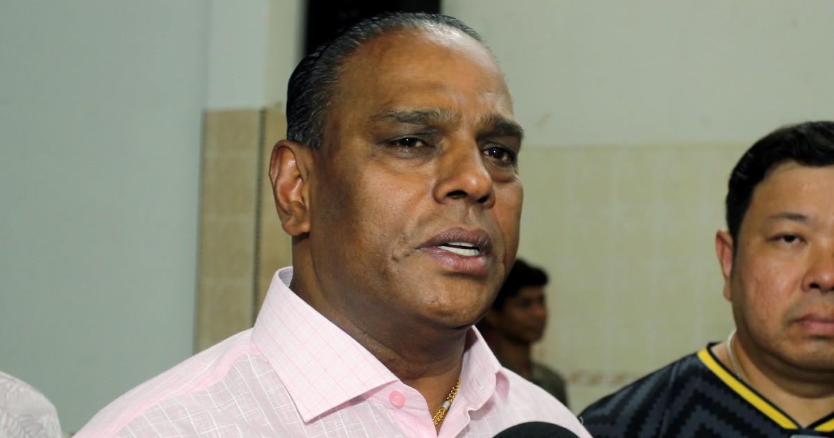 Black-clad supporters gather as Saravanan faces corruption charges over foreign worker recruitment