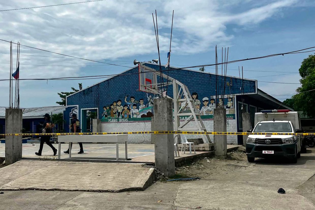 Two teenage students arrested after armed assault at Philippine high school leaves three dead