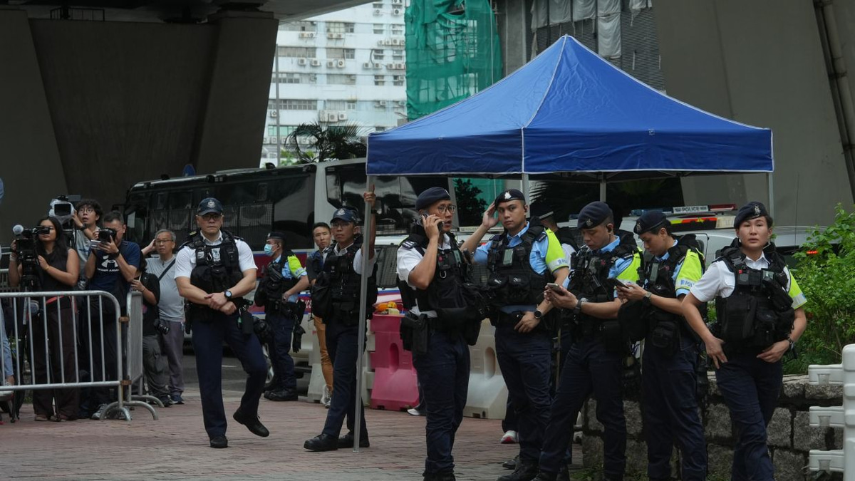 Hong Kong Woman Arrested for Seditious T-Shirt as Court Convicts Democracy Activists