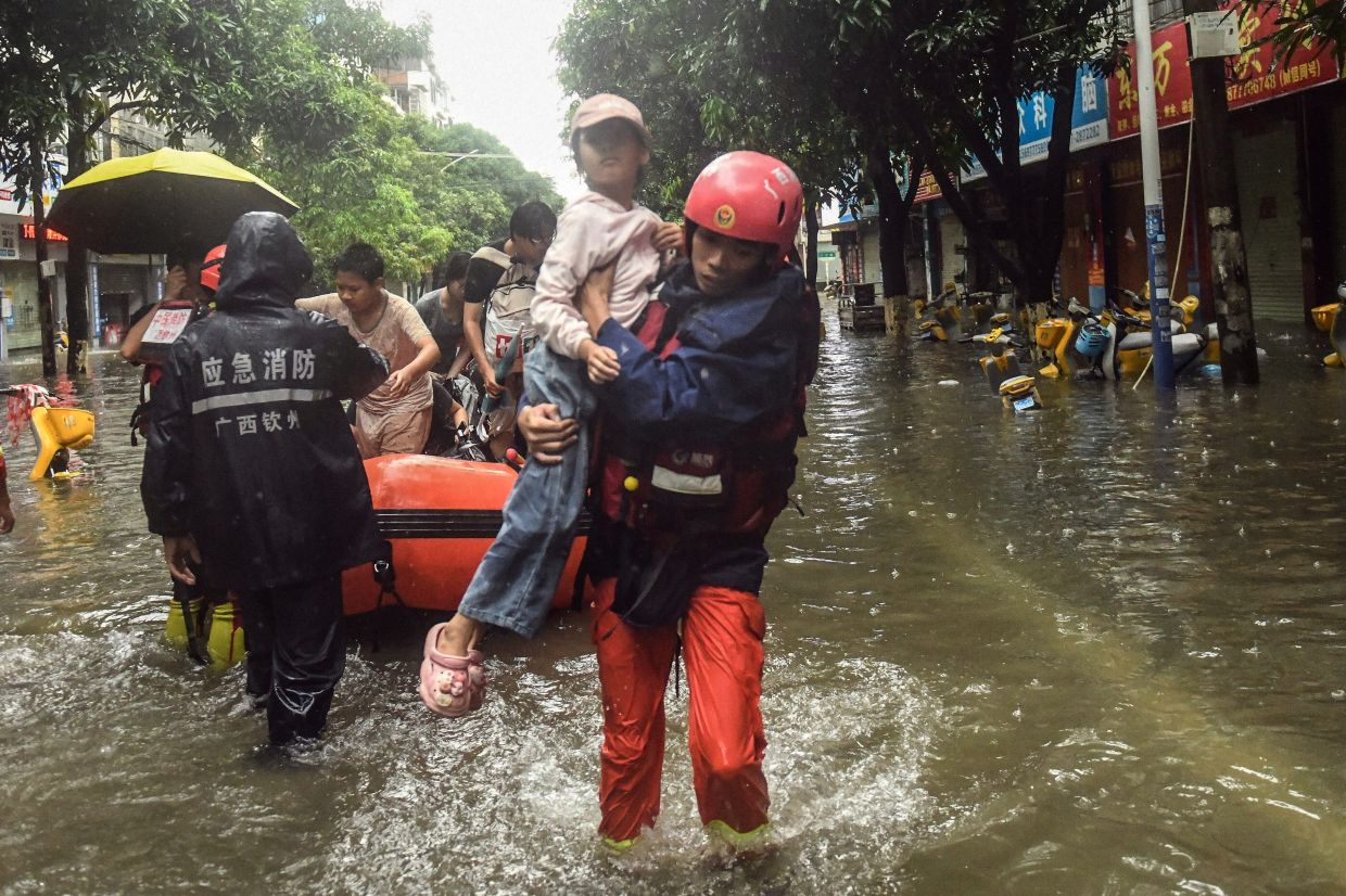 China battles multiple disasters as storms kill dozens, displace 100,000