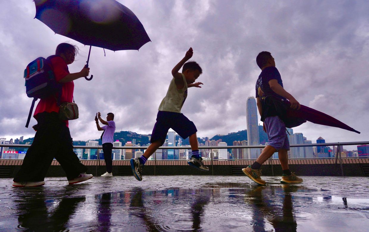 Rain finally breaks Hong Kong's record-shattering summer heat wave