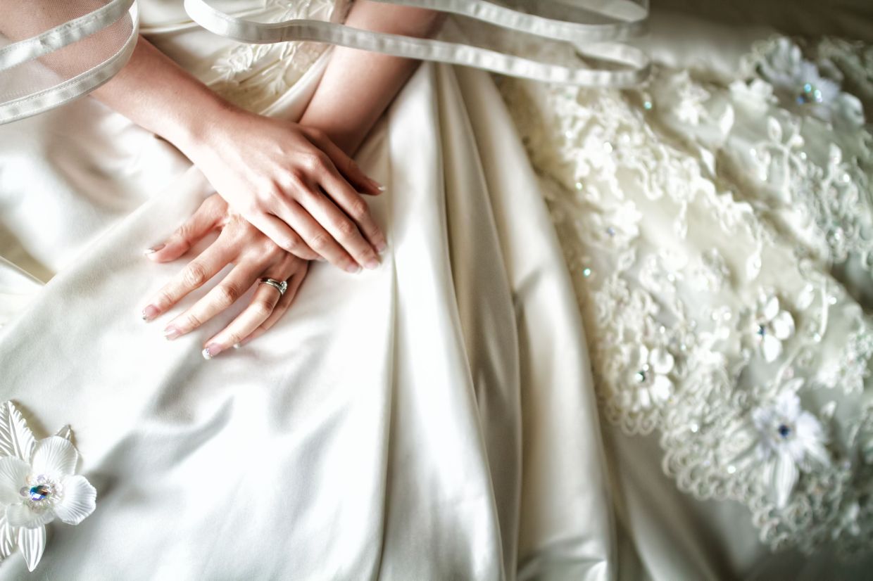 The emotional weight of heirloom wedding dresses and finding peace in letting go