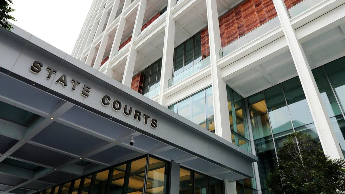 Singapore woman charged in S$32 million luxury goods fraud linked to Thai national's scam