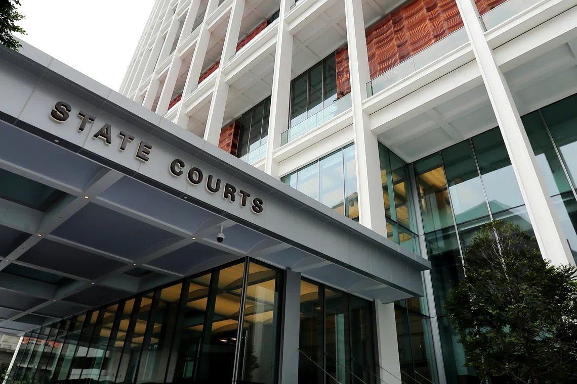 Singapore woman charged in S$32 million luxury goods fraud linked to Thai national's scam