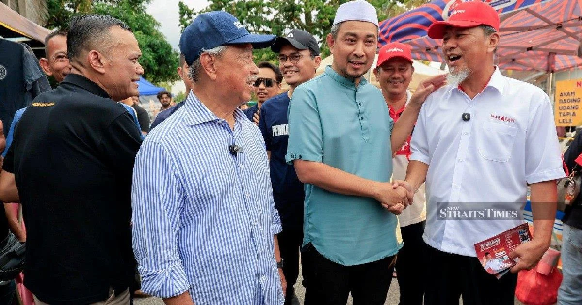 Johor candidates face off at night market as campaign heats up