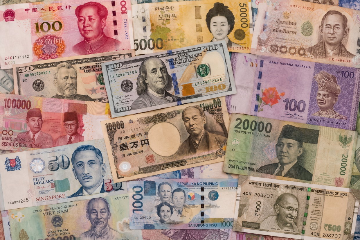 Asian Markets Rocked by Middle East Tensions as Currencies Slide and Seoul Equities Plummet
