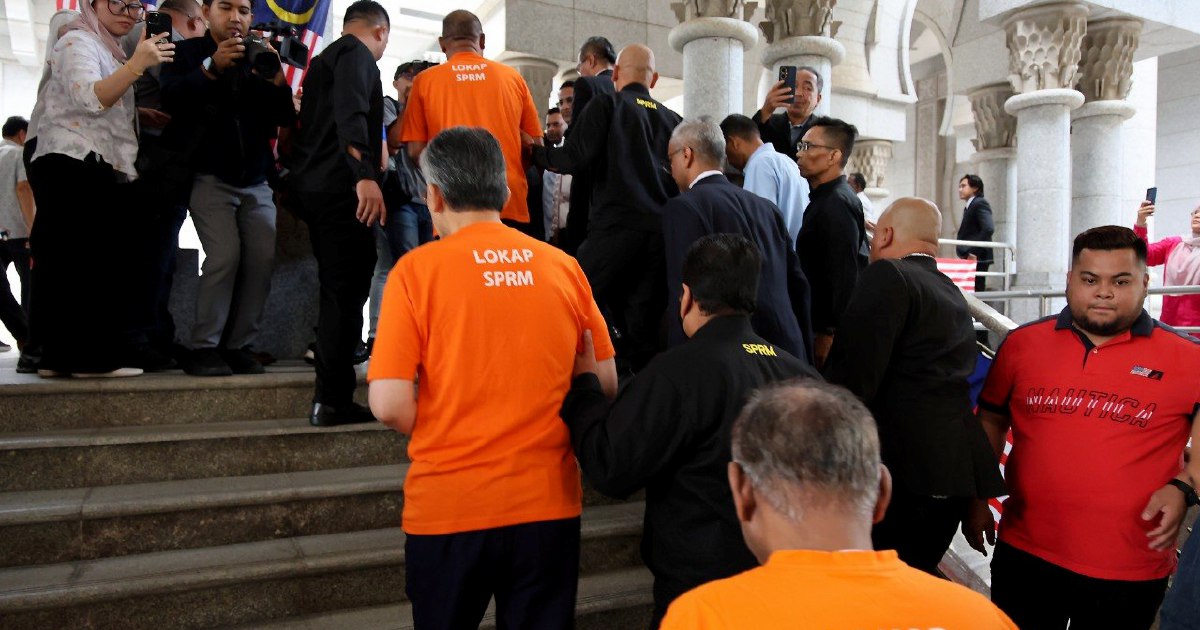 Ex-TH Chairman and Former Treasury Official Appear for Remand Hearing at Putrajaya Court