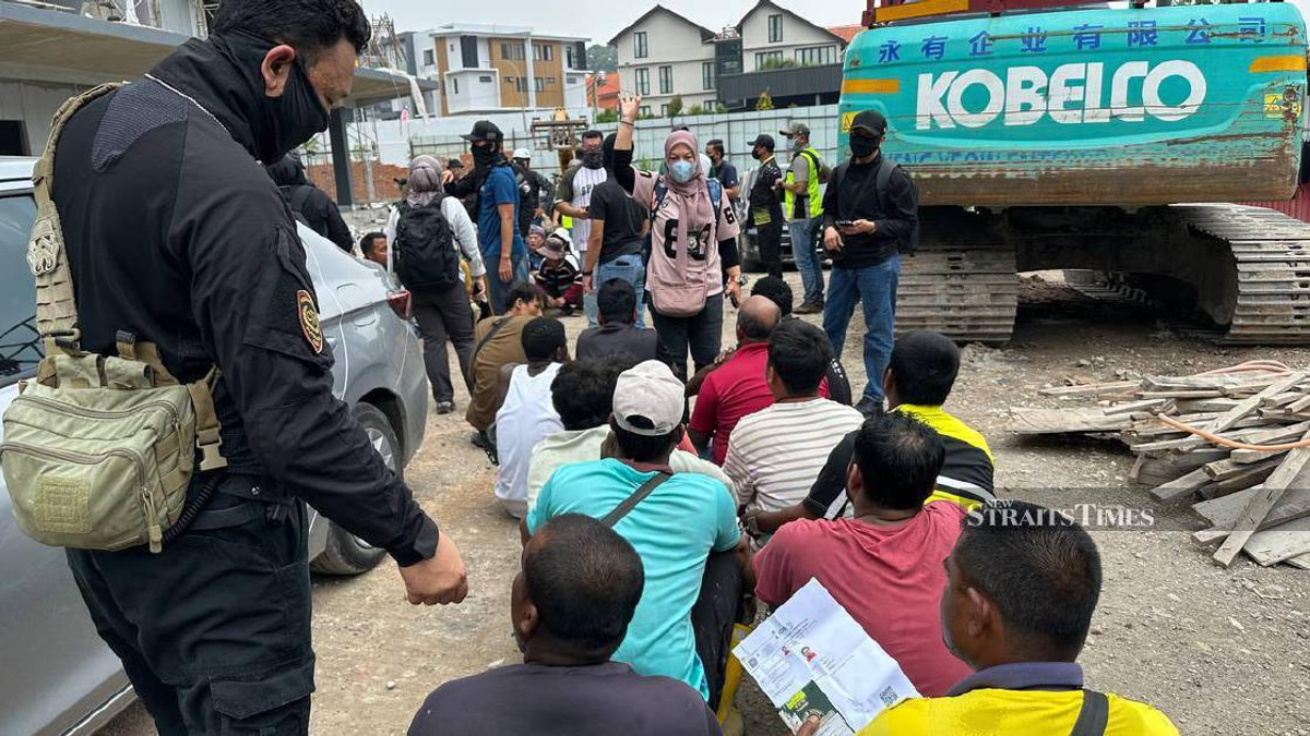 Malaysia arrests 528 foreign workers in major construction site immigration sweep