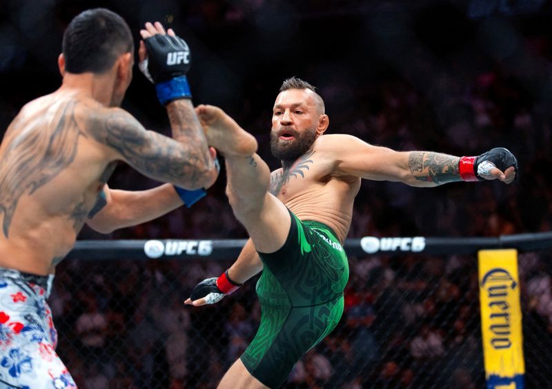 McGregor Vows to Return After Freak Knee Injury Ends Vegas Comeback in 69 Seconds