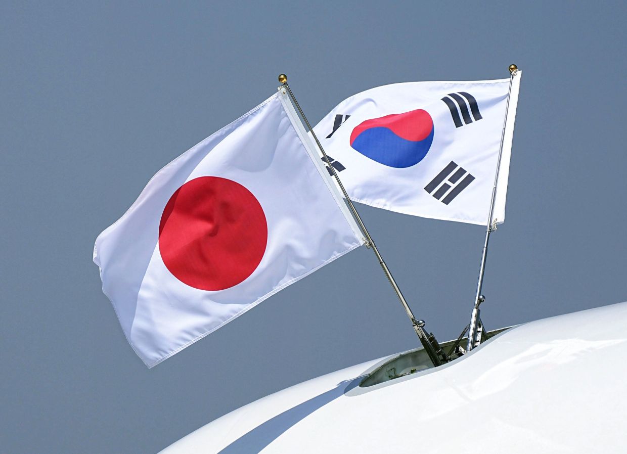 Nuclear Dominoes: How One Asian Ally's Bomb Could Trigger Regional Arms Race