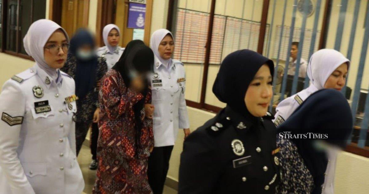 Three women charged over dangerous motorcycle 'Superman' stunt in Kuantan
