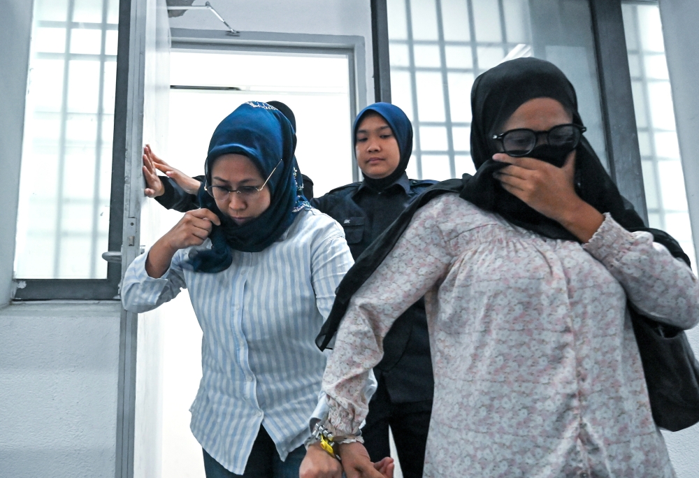 Two women charged in Perak over RM120,000 scam targeting retiree with false tax demands
