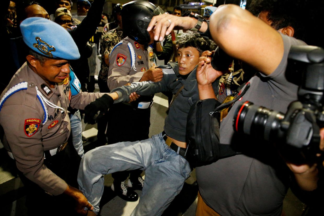 Indonesia charges four protesters after Surabaya anti-government rally over fuel prices and school meals scheme